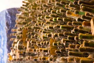 Tuscany Wine Trail - Old wine bottles in the cellar